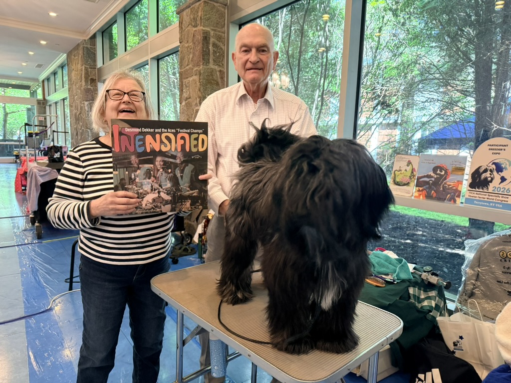 Desmond on the grooming table with Ron and Margy Pankiewicz at the TTCA Breeder's Expo